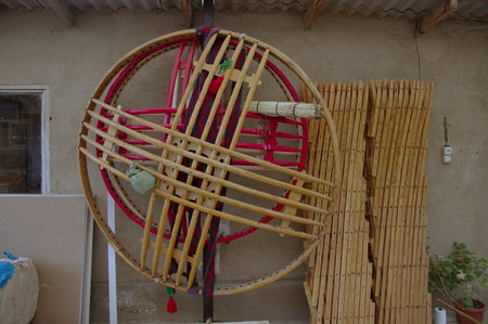 Crown of the yurt on the wall in Kyrgyzstanの写真素材