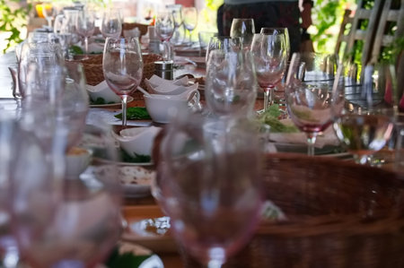Wooden table after party with dishes and food