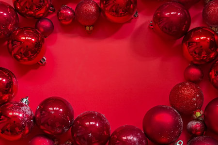 Christmas balls on the red backgroundの写真素材