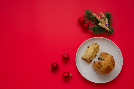 Directly above shot of Christmas bread, balls on red backgroundの写真素材