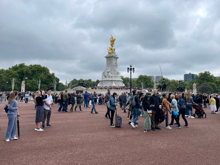 London, United Kingdom - September 9 2022: A gathering of people in front of Buckingham Palace to...