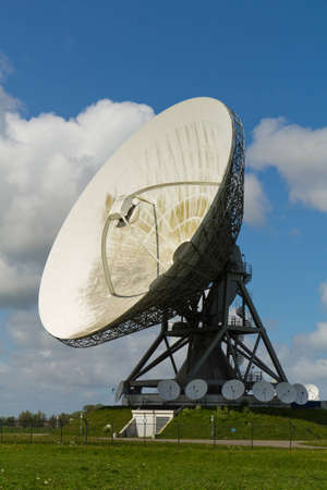 large and small dishes with a cloudy skyの写真素材