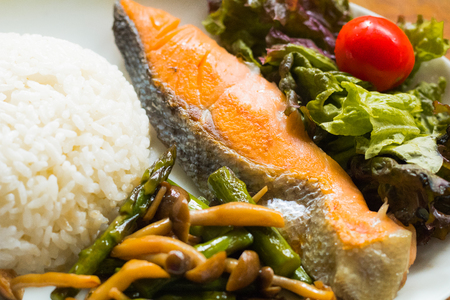 Sea Fish Fried ,white rice,fried vegetables and vegetable salad for  healthy eating .の写真素材