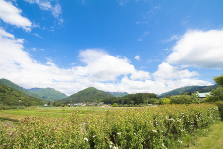 Beautiful landscape of Takayama mura at sunny summer or spring day and blue sky in Kamitakai District in northeast Naganoの写真素材