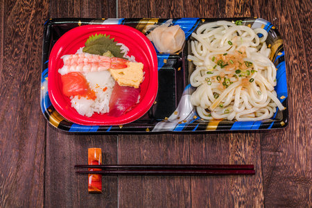 Japanese food (Tekka Don) and udon noodles , Japanese cuisine   on a grey wooden table wall background .の写真素材