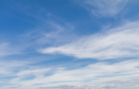 Blue sky background with white clouds.の写真素材