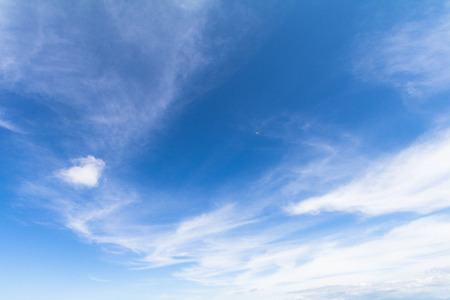 Blue sky background with white clouds.の写真素材