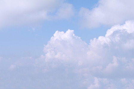Blue sky background with white clouds.の写真素材
