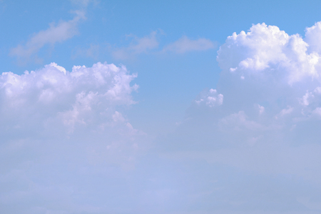 Blue sky background with white clouds.の写真素材