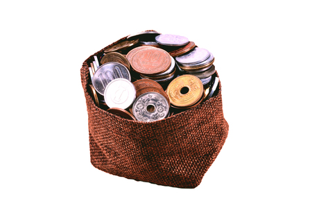 Japanese coins in sackcloth isolated on  white background with clipping path.の写真素材