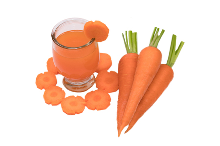 Healthy eating and dieting concept,fresh carrot  and carrot juice or organic healthy juice in glass   isolated on white background with clipping path.の写真素材
