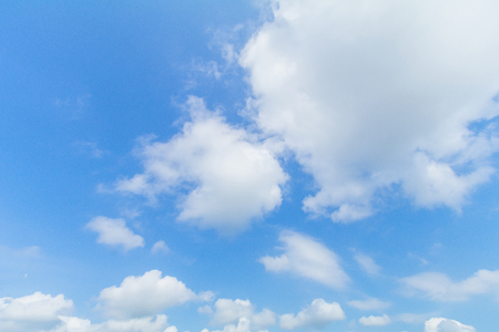 Blue sky background with white clouds.の写真素材