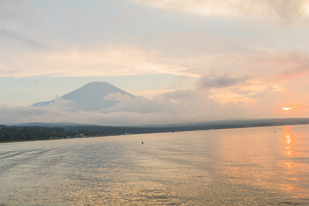 Mt. Fuji and sunset with sun rays at Lake Kawaguchiko, the most famous place in Japan to traveling in Yamanashi Prefecture, Japanの写真素材