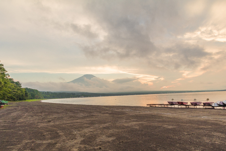 Mt. Fuji and sun rays  of sunset at  Kawaguchiko Lake, the most famous place in Japan to traveling in Yamanashi Prefecture, Japanの写真素材