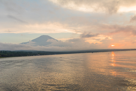 Mt. Fuji and sun rays  of sunset at  Kawaguchiko Lake, the most famous place in Japan to traveling in Yamanashi Prefecture, Japanの写真素材