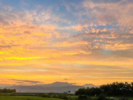 Beautiful  sun rays  of sunset with colorful of  sky backgroundの写真素材