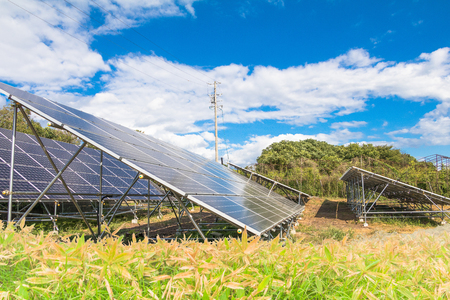 Solar power panels ,Photovoltaic modules for innovation green energy for life with blue sky backgroundの写真素材