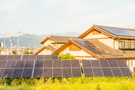 Solar power panels ,Photovoltaic modules for innovation green energy for life with blue sky backgroundの写真素材