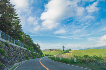 Beautiful  landscape view of  a country road with  blue sky  background in Utsukushigahara park is  one of the most important and popular natural place in Nagano Prefecture , Japan.の写真素材