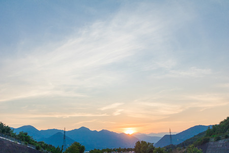 Beautiful  sun rays  of sunset with colorful of  sky backgroundの写真素材