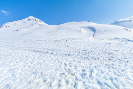 The snow mountains of Tateyama Kurobe alpine  with blue sky  background is  one of the most important and popular natural place in Toyama Prefecture, Japan.の写真素材