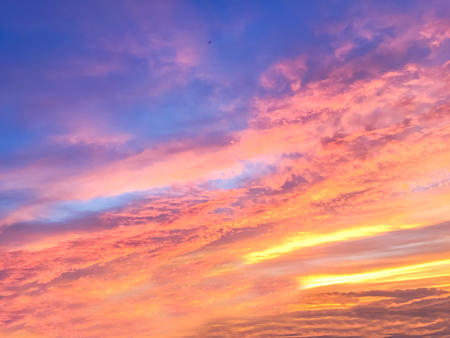 Beautiful  sun rays  of sunset  and with colorful of  sky backgroundの写真素材