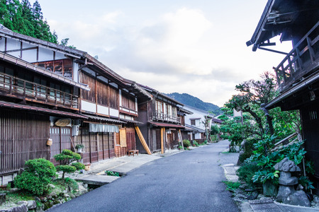 Kiso valley is the old  town or Japanese traditional wooden buildings for the travelers walking at historic old street  in Narai-juku , Nagano Prefecture, JAPAN.の写真素材