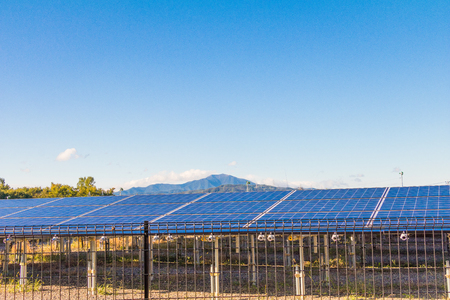 Solar power panels ,Photovoltaic modules for innovation green energy for life with blue sky background.の写真素材