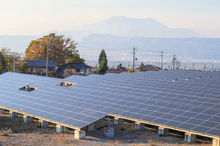 Solar power panels ,Photovoltaic modules for innovation green energy for life with blue sky background.の写真素材