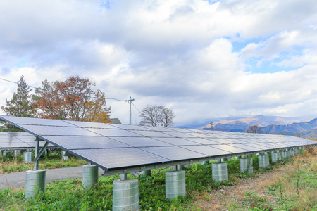 Solar power panels ,Photovoltaic modules for innovation green energy for life with blue sky background.の写真素材