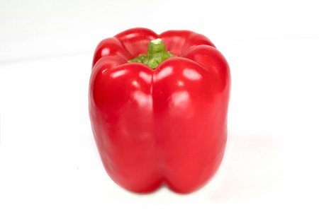 Fresh red peppers isolated on a white background with clipping path.の写真素材