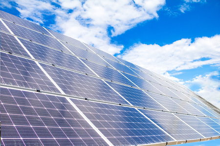 Solar power panels and blue sky background.の写真素材