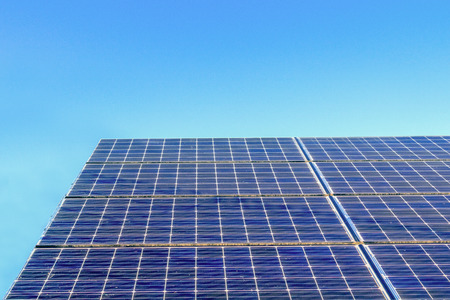 Solar power panels ,Photovoltaic modules for innovation green energy for life with blue sky background.の写真素材