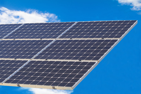 Solar power panels and blue sky background.の写真素材