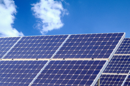 Solar power panels ,Photovoltaic modules for innovation green energy for life with blue sky background.の写真素材