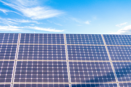 Solar power panels for innovation green energy for life with blue sky background.の写真素材