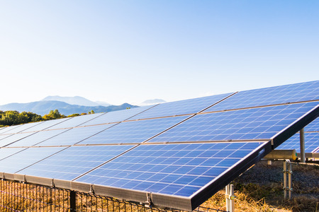 Solar power panels ,Photovoltaic modules for innovation green energy for life with blue sky background.の写真素材