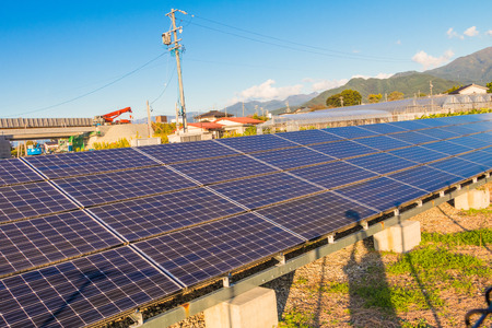Solar power panels ,Photovoltaic modules for innovation green energy for life with blue sky background.の写真素材