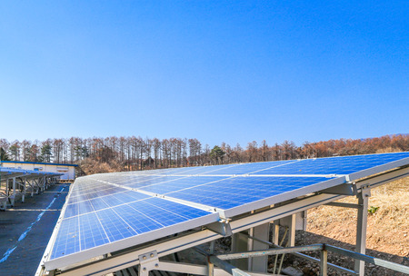 Solar power panels ,Photovoltaic modules for innovation green energy for life with blue sky background.の写真素材