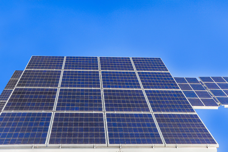 Solar power panels ,Photovoltaic modules for innovation green energy for life with blue sky background.の写真素材