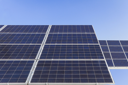 Solar power panels ,Photovoltaic modules for innovation green energy for life with blue sky background.の写真素材