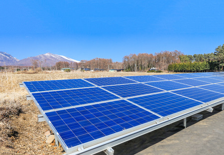 Solar power panels ,Photovoltaic modules for innovation green energy for life with blue sky background.の写真素材