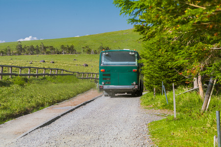 Green bus  and beautiful landscape view of of Utsukushigahara is  one of the most important and popular natural place in Nagano , Japan.の写真素材