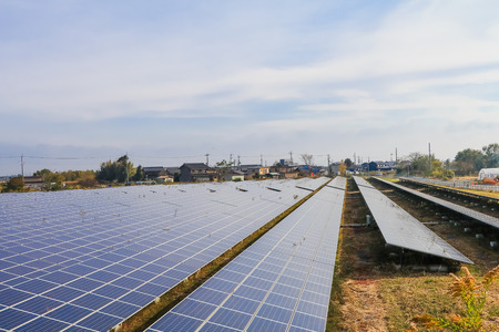 Solar power panels ,Photovoltaic modules for innovation green energy for life with blue sky background.の写真素材