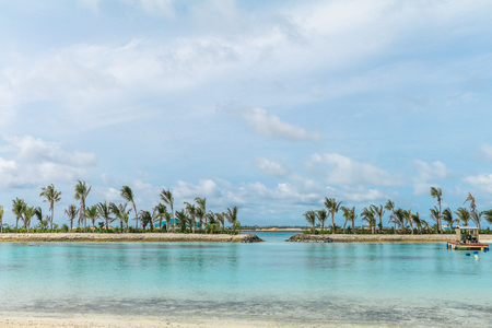 Amazing island in the Maldives ,Beautiful turquoise waters and white sandy beach with  blue sky  background for holiday vacation .の写真素材
