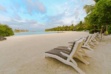 Amazing island in the Maldives ,Beautiful turquoise waters and white sandy beach with  blue sky  background for holiday vacation .の写真素材