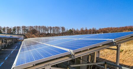 Solar power panels ,Photovoltaic modules for innovation green energy for life with blue sky background.の写真素材