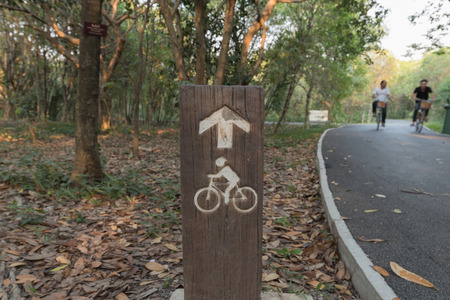 wood signs cyclistsの写真素材