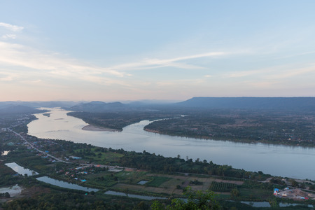 Mekong River between Thai country and Laos country with dim fogの写真素材