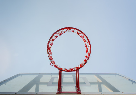 Basketball hoop on a blue sky
